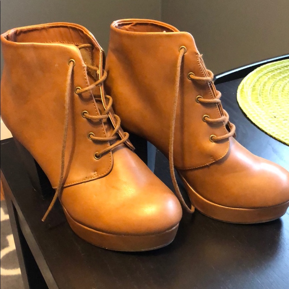 Lightly worn heeled booties
